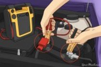 clamps attached to the battery booster