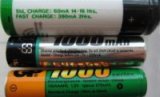 Photo showing the charging instructions and times written on the side of three rechargeable batteries