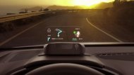 The Navdy head up display lets you continue to view your navigation while also taking or ...